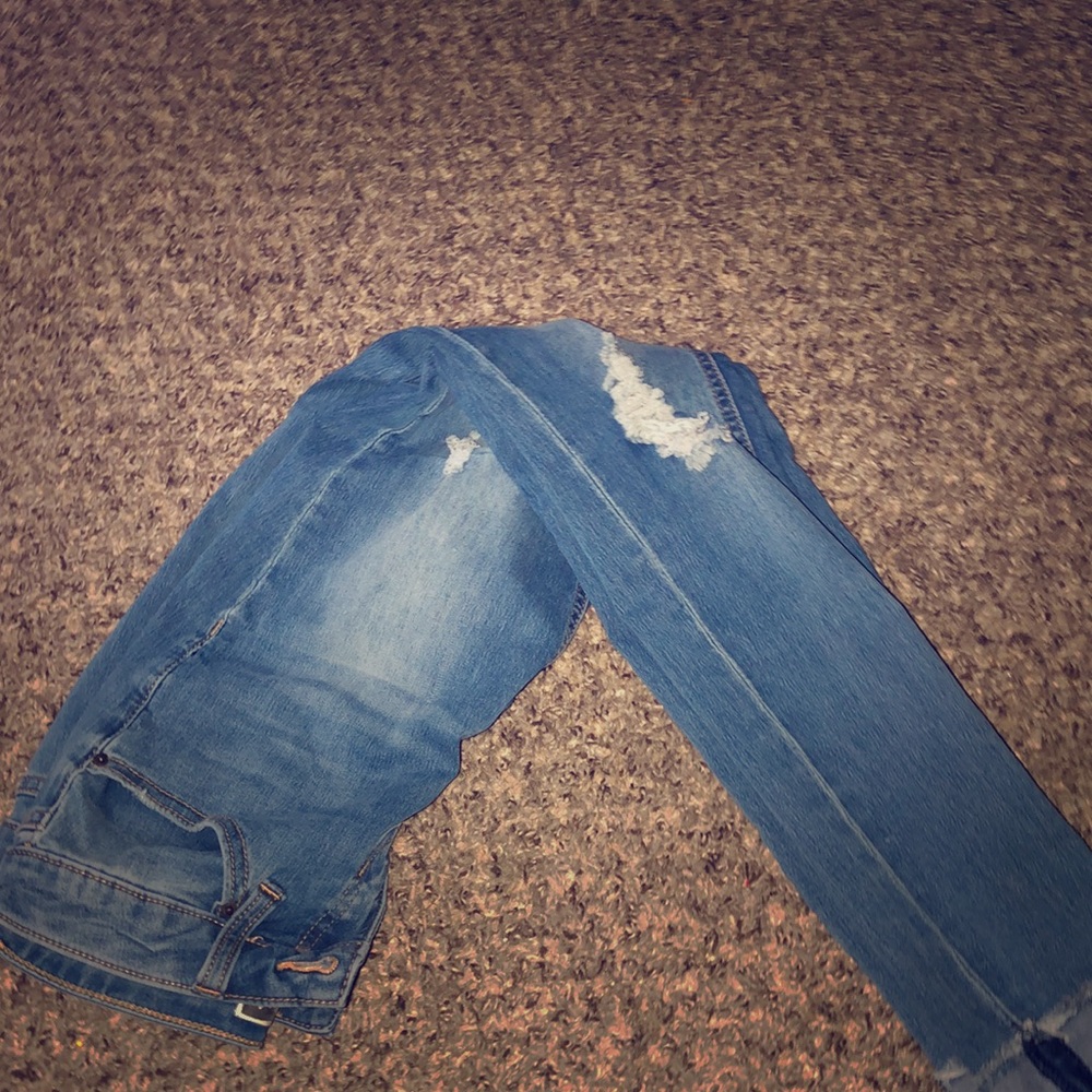lightly washed cut up blue jean - jeans